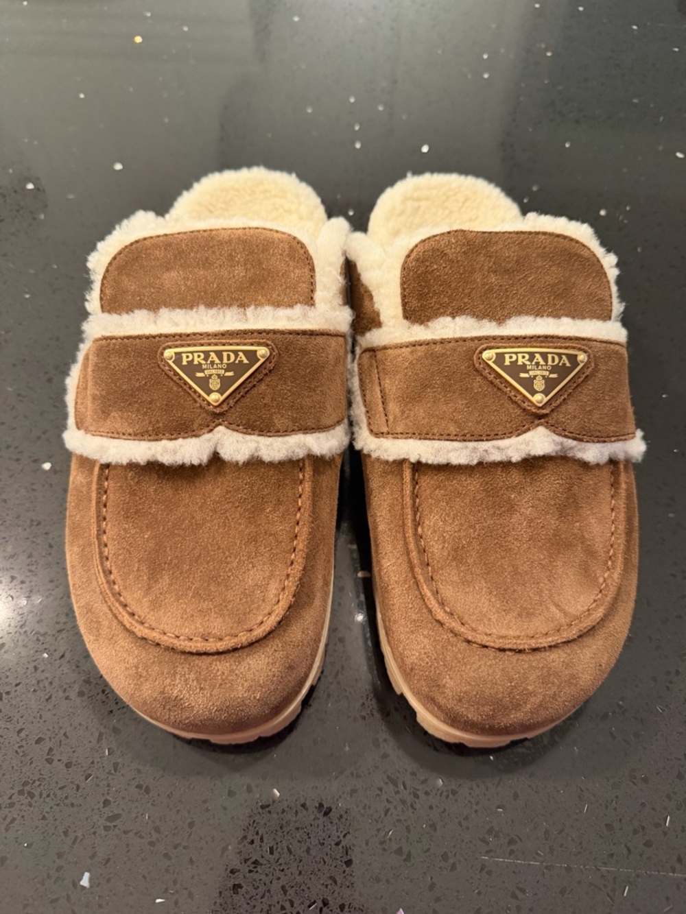 Prada Brown Suede Shearling-Trim Slip-Ons with Gold Logo